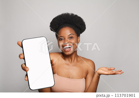 Perfect healthy woman holding smartphone with white empty blank screen display 113701901