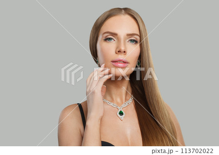 Gorgeous jewelry model beautiful woman portrait. Brunette woman with long smooth hair and necklace 113702022