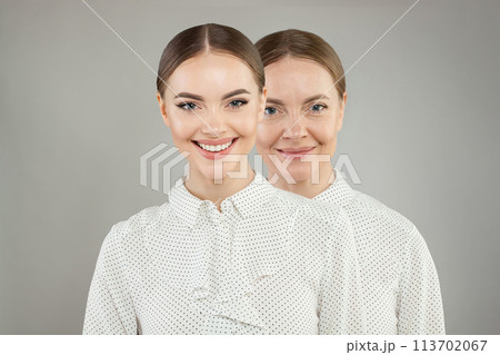 Good-looking models. Young and old woman on white background. Aging, cosmetology, generation Good-looking models. Young and old woman on white background. Aging, cosmetology, generation 113702067