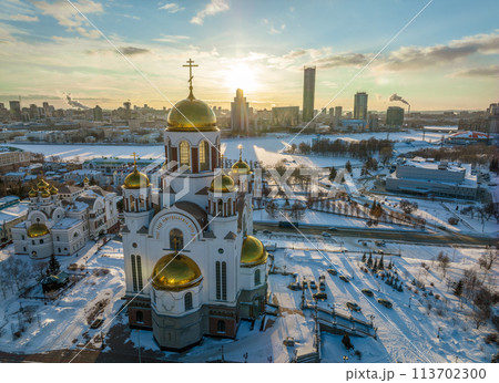 Winter Yekaterinburg and Temple on Blood in beautiful blue clear sunset. Aerial view of Yekaterinburg, Russia. Translation of the text on the temple Winter Yekaterinburg and Temple on Blood in beautiful blue clear sunset. Aerial view of Yekaterinburg, Russia. Translation of the text on the temple 113702300