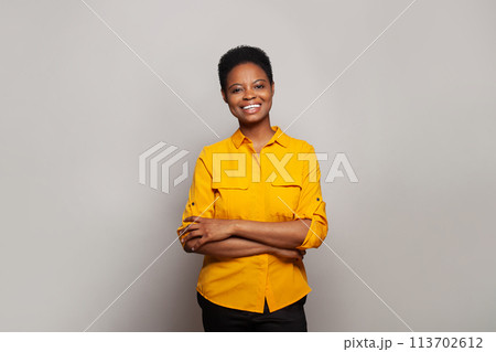 Perfect successful woman smiling and having fun against studio wall banner background Perfect successful woman smiling and having fun against studio wall banner background 113702612