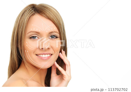 Isolated fashion model face close up. Medicine, facial treatment, massage Isolated fashion model face close up. Medicine, facial treatment, massage 113702702