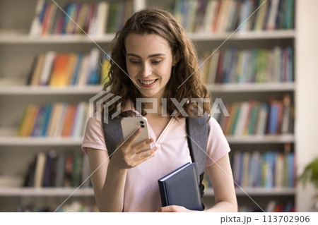Girl student send message use mobile phone 113702906