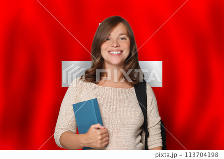 Happy woman student against Swiss flag background. Travel, education and learn language 113704198