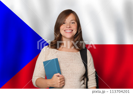 Happy woman student against Czech flag background. Travel, education  113704201