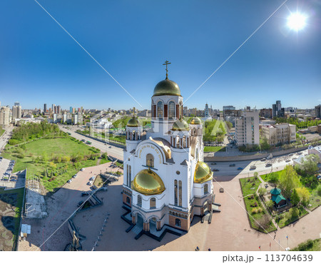 Summer Yekaterinburg and Temple on Blood in beautiful clear sunset.. Aerial view of Yekaterinburg, Russia. Translation of the text on the temple Summer Yekaterinburg and Temple on Blood in beautiful clear sunset.. Aerial view of Yekaterinburg, Russia. Translation of the text on the temple 113704639