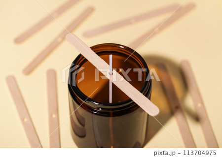 Candle Wicks on Beige background. Making homemade candle 113704975