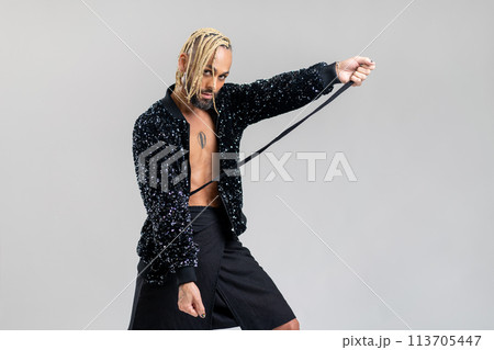 Gay man wearing skirt dancing 113705447