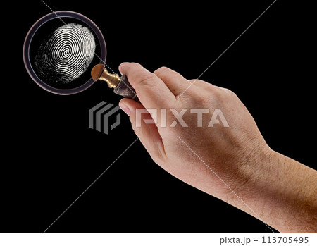 Male Hand Holding Magnifying Glass Viewing A Fingerprint on a Black Background. Male Hand Holding Magnifying Glass Viewing A Fingerprint on a Black Background. 113705495