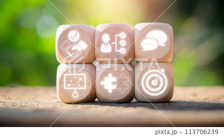 Negotiation concept, Wooden block on desk with agreement, skills, communicate, tactic, collaboration and goal icon on virtual screen. 113706239