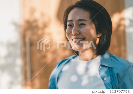 a forty-something woman a forty-something woman 113707798