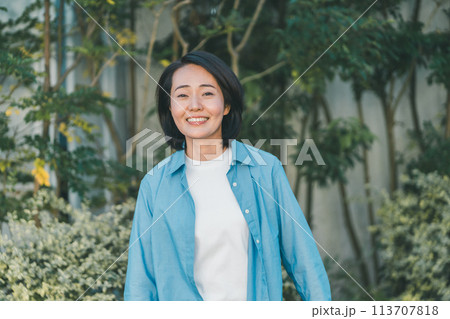 a forty-something woman a forty-something woman 113707818