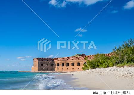Waves and beach surf outside Fort Jefferson on Dry Tortugas National Park. Waves and beach surf outside Fort Jefferson on Dry Tortugas National Park. 113709821