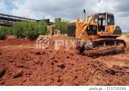 Heavy Power Bulldozer work on a building site 113710589