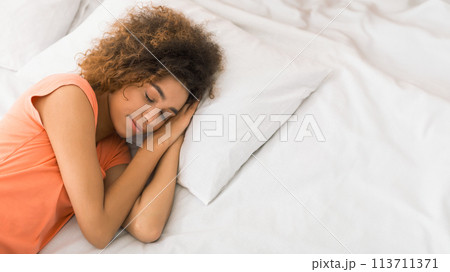 African-american woman sleeping in her bed at home 113711371