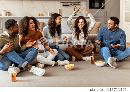 Friends having a conversation with drinks, have home party Friends having a conversation with drinks, have home party 113711593
