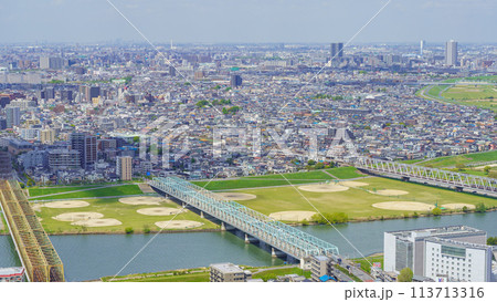 千葉県市川市から見た江戸川と東京の街並み 千葉県市川市から見た江戸川と東京の街並み 113713316