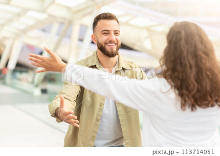 Loving Man And Woman Meeting At Airport After Arrival 113714051