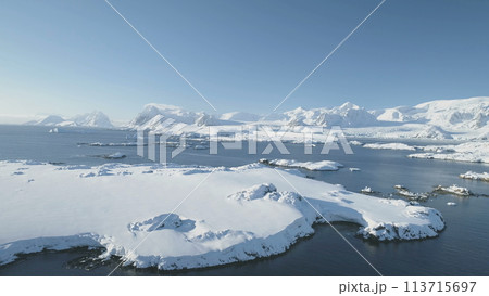 Arctic Epic Ocean Mountain Landscape Aerial View. North Antarctica Open Water Coast Majestic Landscape Overview. Global Warming Nature Concept Drone Flight 113715697