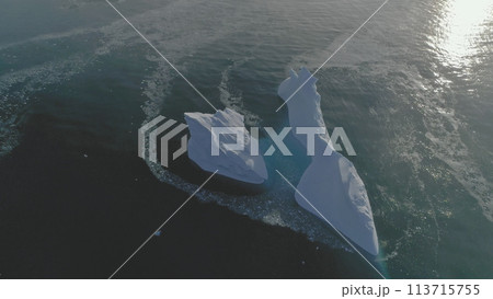 Iceberg Float Open Water Ocean Drone Aerial View. Huge Ice Melt Global Antarctica Climate Change Concept Tracking Flight. Winter Polar Glacier Arctic Seascape 113715755