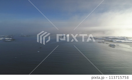 Antarctica Open Water Glacier Iceberg Aerial View. Ice Melt in Winter Ocean Surface Drone Flight Above Overview. Antarctica Wild Majestic Seascape Climate Change Concept 113715758