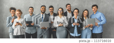 Professional team with laptops in grayscale, web-banner 113716010