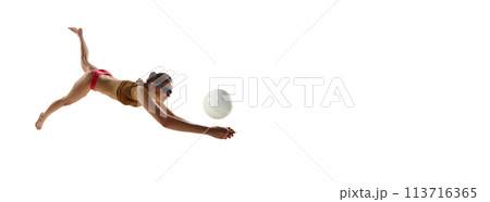 Banner. Young athlete woman, beach volleyball player passes ball in motion against white background. Negative space. Banner. Young athlete woman, beach volleyball player passes ball in motion against white background. Negative space. 113716365