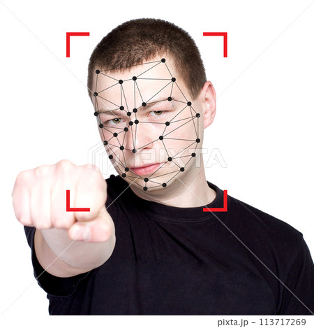 Young man and technology biometric security system. Facial recognition concept Young man and technology biometric security system. Facial recognition concept 113717269