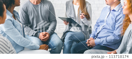 Psychologist talking to addicted people in office Psychologist talking to addicted people in office 113718174