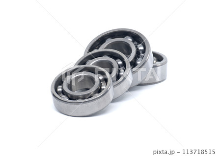Ball bearings without seal isolated on white background Ball bearings without seal isolated on white background 113718515