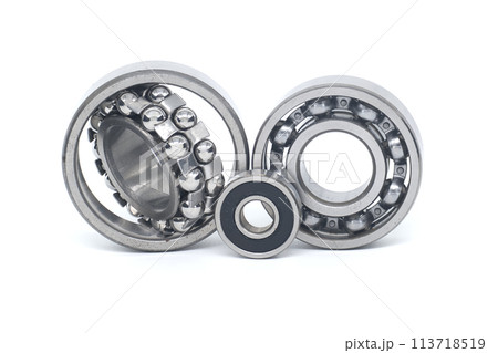 Bearings of varying sizes and types isolated on white background Bearings of varying sizes and types isolated on white background 113718519