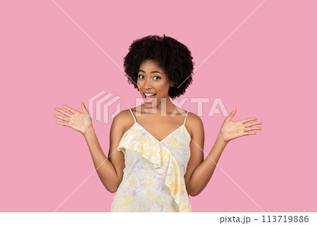 Woman with arms open in surprise on pink Woman with arms open in surprise on pink 113719886