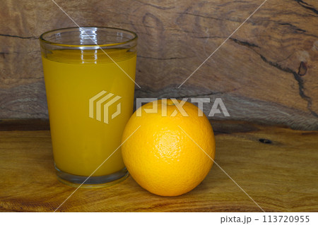 Valencia Orange Fruit With Glass Of Juice (Citrus x sinensis) Valencia Orange Fruit With Glass Of Juice (Citrus x sinensis) 113720955