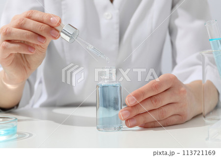 Cosmetics with chemical test tubes and pipette 113721169