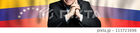 Politician or businessman on background of Venezuela and Russia flags Politician or businessman on background of Venezuela and Russia flags 113721698