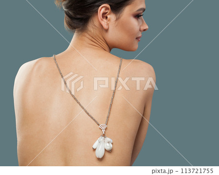 Pretty jewelry model. Woman with bijou close up Pretty jewelry model. Woman with bijou close up 113721755