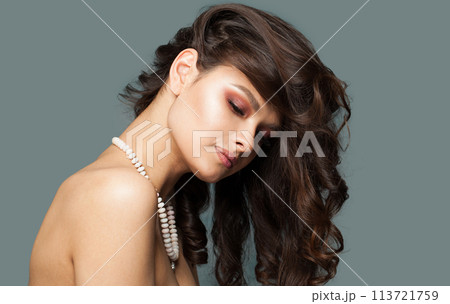 Glamorous jewelry model. Woman with bijou close up Glamorous jewelry model. Woman with bijou close up 113721759