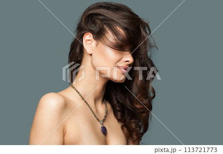 Stylish healthy model woman with beautiful hairstyle, fresh skin and make-up wearing jewelry. Stylish healthy model woman with beautiful hairstyle, fresh skin and make-up wearing jewelry. 113721773