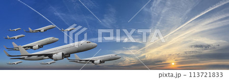 Flight fly and aircraft concept. Plane and sunset sky with cloud and sun Flight fly and aircraft concept. Plane and sunset sky with cloud and sun 113721833