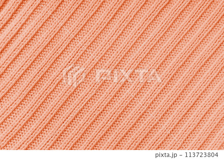 Jersey textile background , orange diagonal striped knitted fabric, cloth surface Jersey textile background , orange diagonal striped knitted fabric, cloth surface 113723804