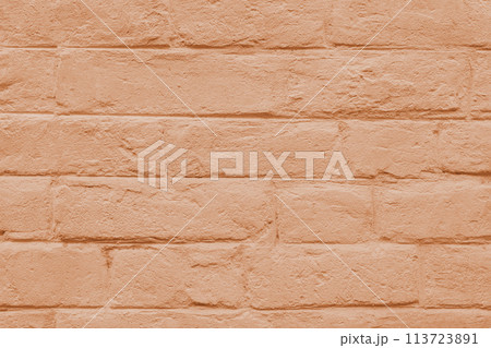 Stained old stucco orange painted  brick wall background, aged masonry texture 113723891