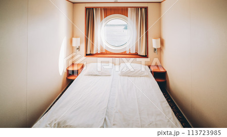 Ship Cabin With Bed And Window With View On Sea. Luxury Cabin On Ferry Boat Or Cruise Liner. 113723985