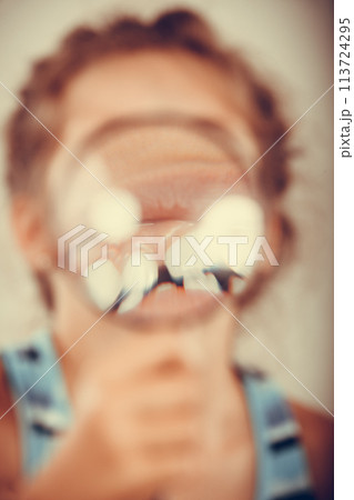 Little girl kid with magnifying glass. 113724295