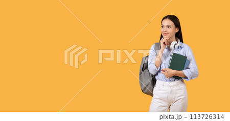 Thoughtful woman with book and backpack, copy space Thoughtful woman with book and backpack, copy space 113726314