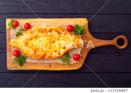 Homemade adjarian khachapuri with egg 113726967