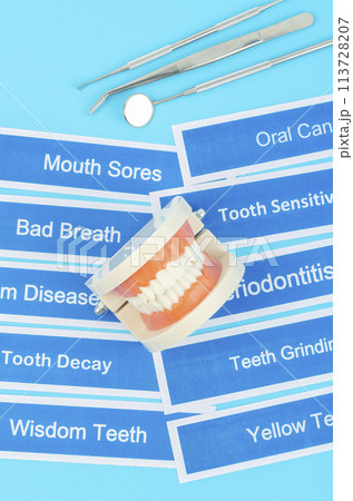 Dentures model with dental disease on blue. 113728207