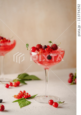 Glass of berry cocktail 113734292