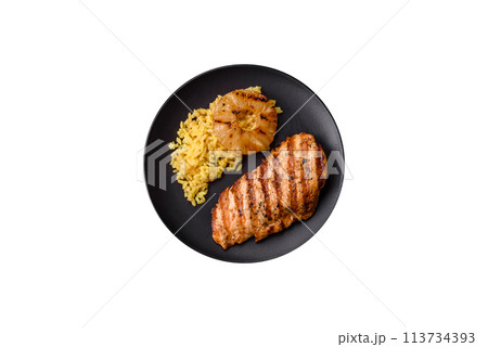 Delicious fresh grilled chicken fillet with spices and herbs 113734393