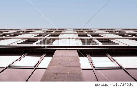 Modern Architectural Detail of Building Facade with Geometric Windows 113734536