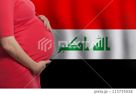 Pregnant woman belly on flag of Iraq background Pregnant woman belly on flag of Iraq background 113735038